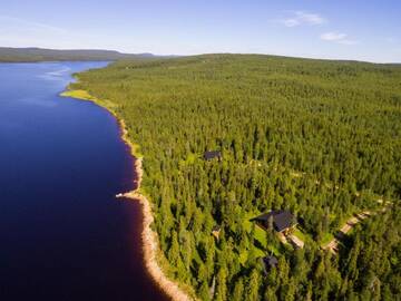 Фото Курортные отели Napapiirin Järvilomat г. Раануйярви 4