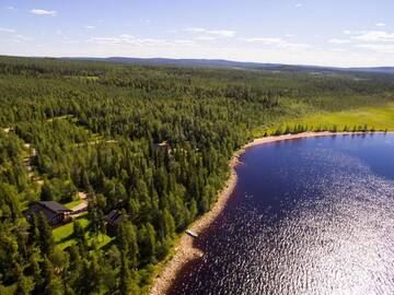 Фото Курортные отели Napapiirin Järvilomat г. Раануйярви 5